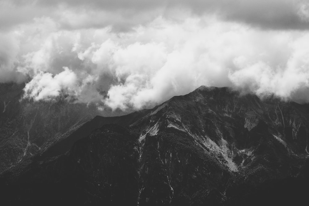 grayscale photograph of mountain ranges