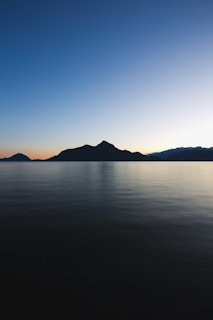 silhouette of mountain range during daytime