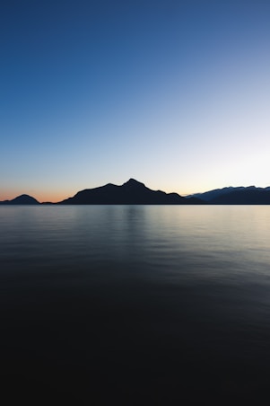 silhouette of mountain range during daytime