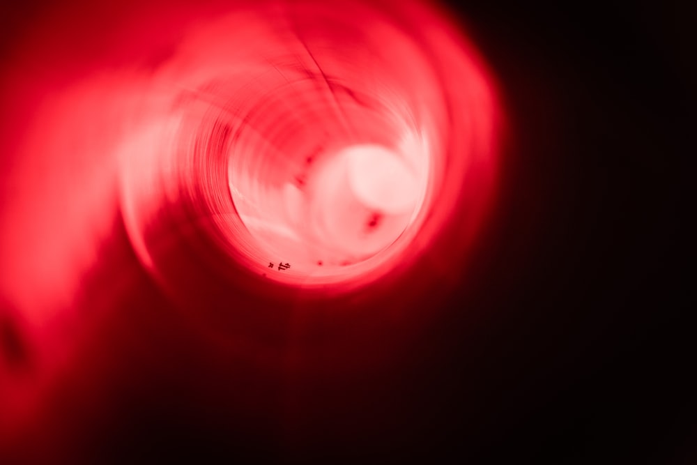 a blurry image of a red object in the dark