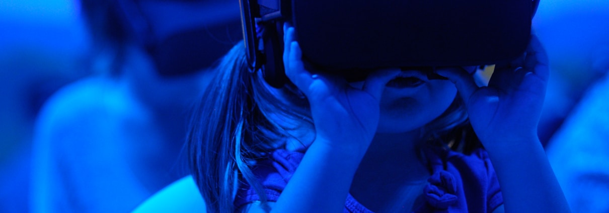 girl using VR goggles