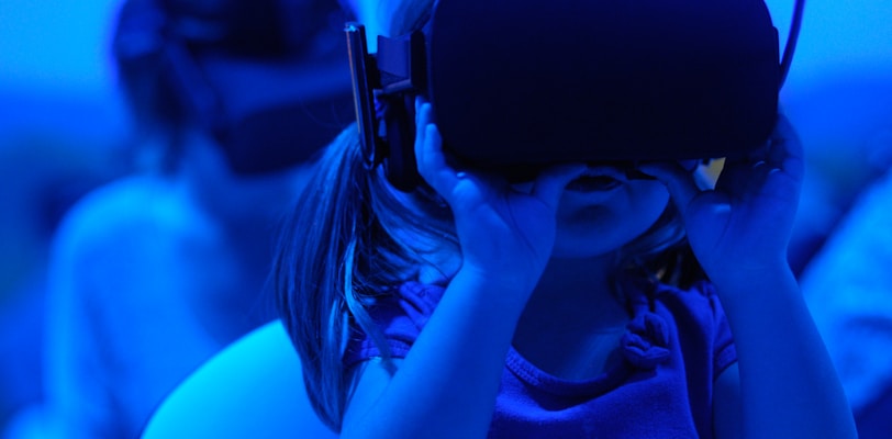 girl using VR goggles