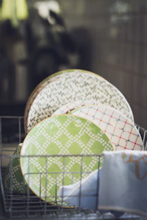 ceramic plates on a drying rack
