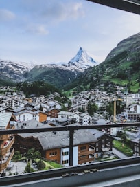 aerial photography of houses near mountains at daytime