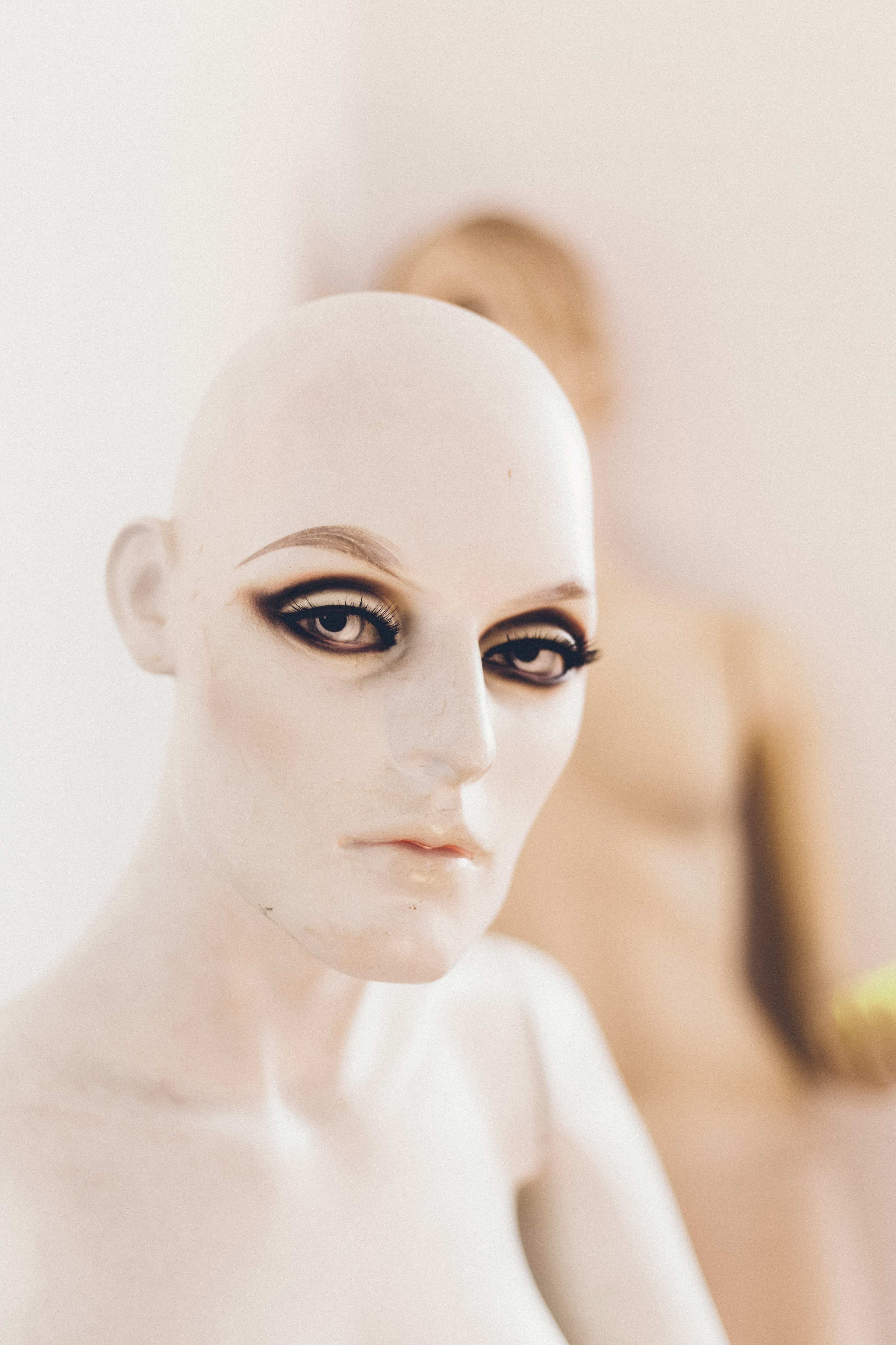 tilt shift lens photography of mannequin