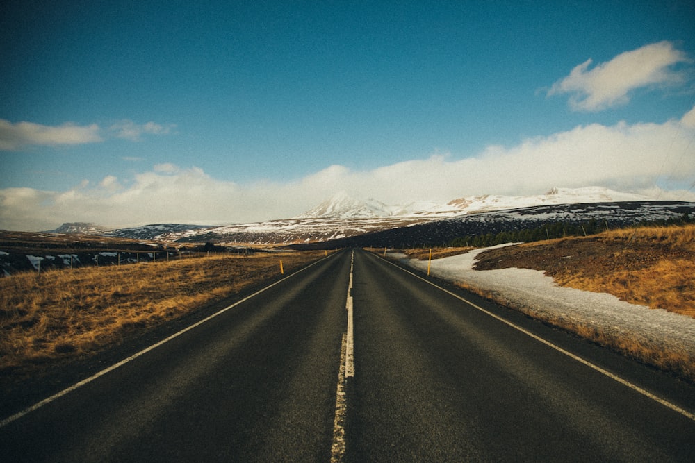 gray pave road during daytime