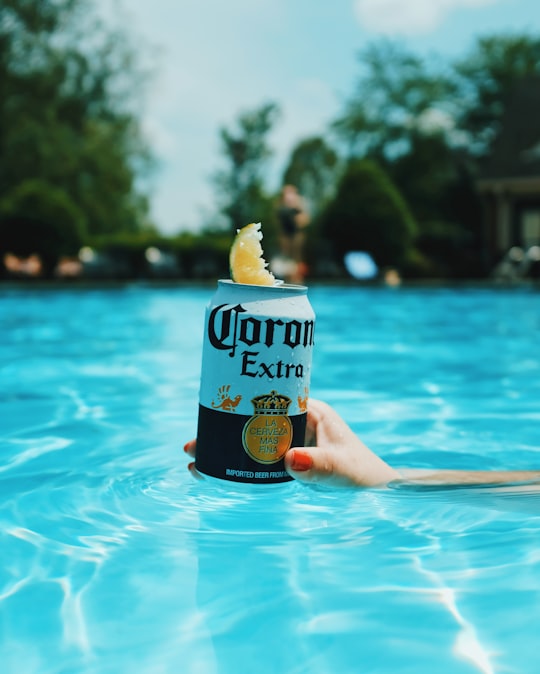 Corona extra beer can on swimming pool in Nashville United States