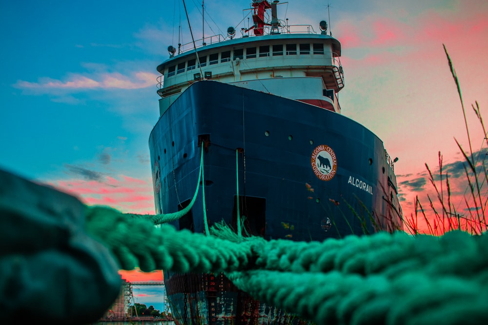 white and black ship on shipyard during daytime