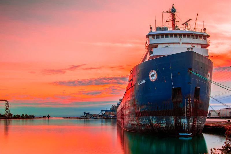 Cargo ship moored at port for marine bunker fuel supply