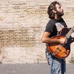 man playing jazz guitar