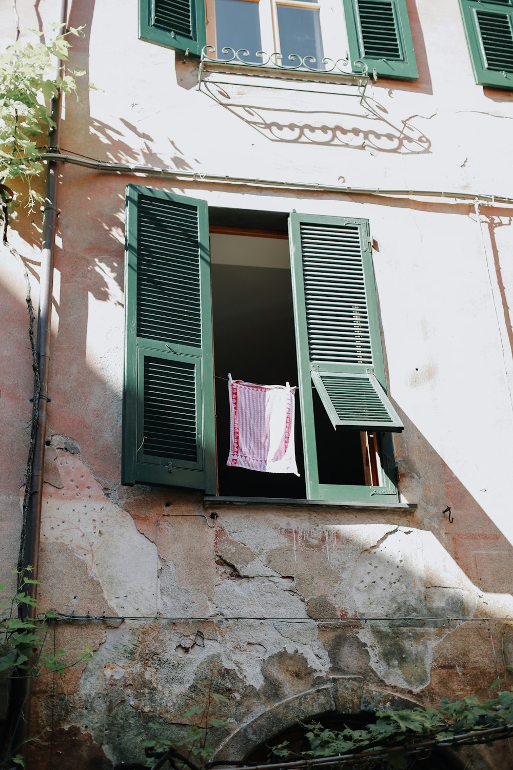 green wooden window