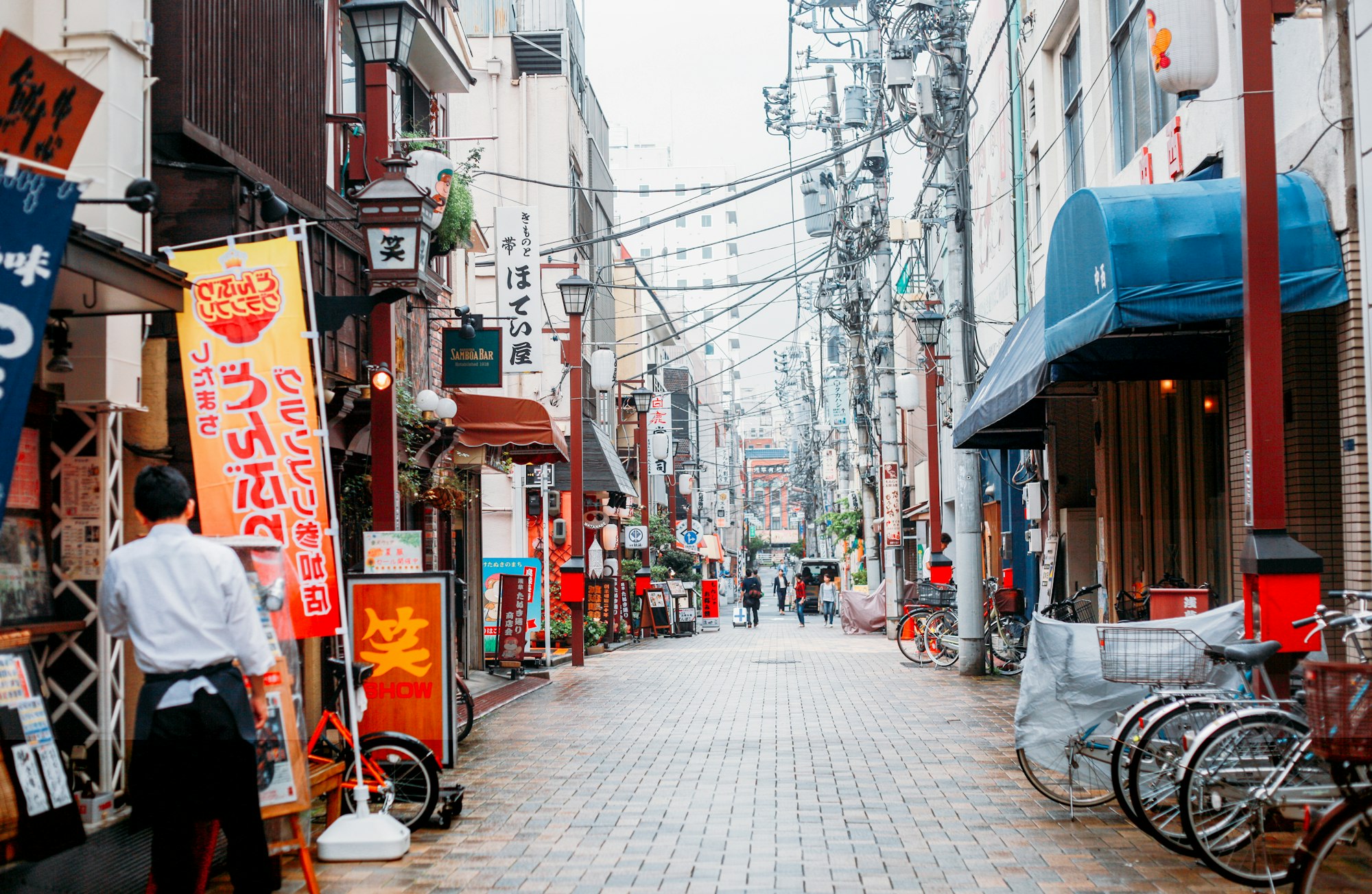 I took this photo in the streets of Tokyo during my first solo trip. 

The bustling streets, the gorgeous signs in hiragana, the sweets in the market… 

Everything seemed extraordinary, and it was.