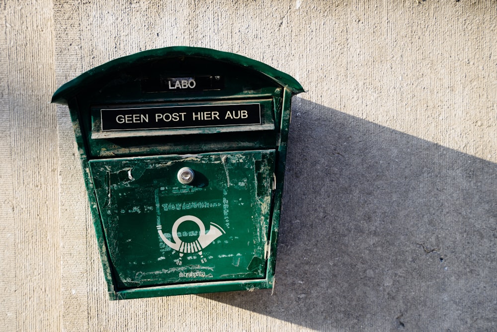 green wall mounted mailbox