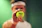 person holding green Wilson tennis ball