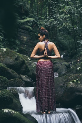 woman twisting her arms to her back