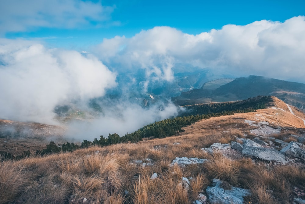 mountain under cloudy sky