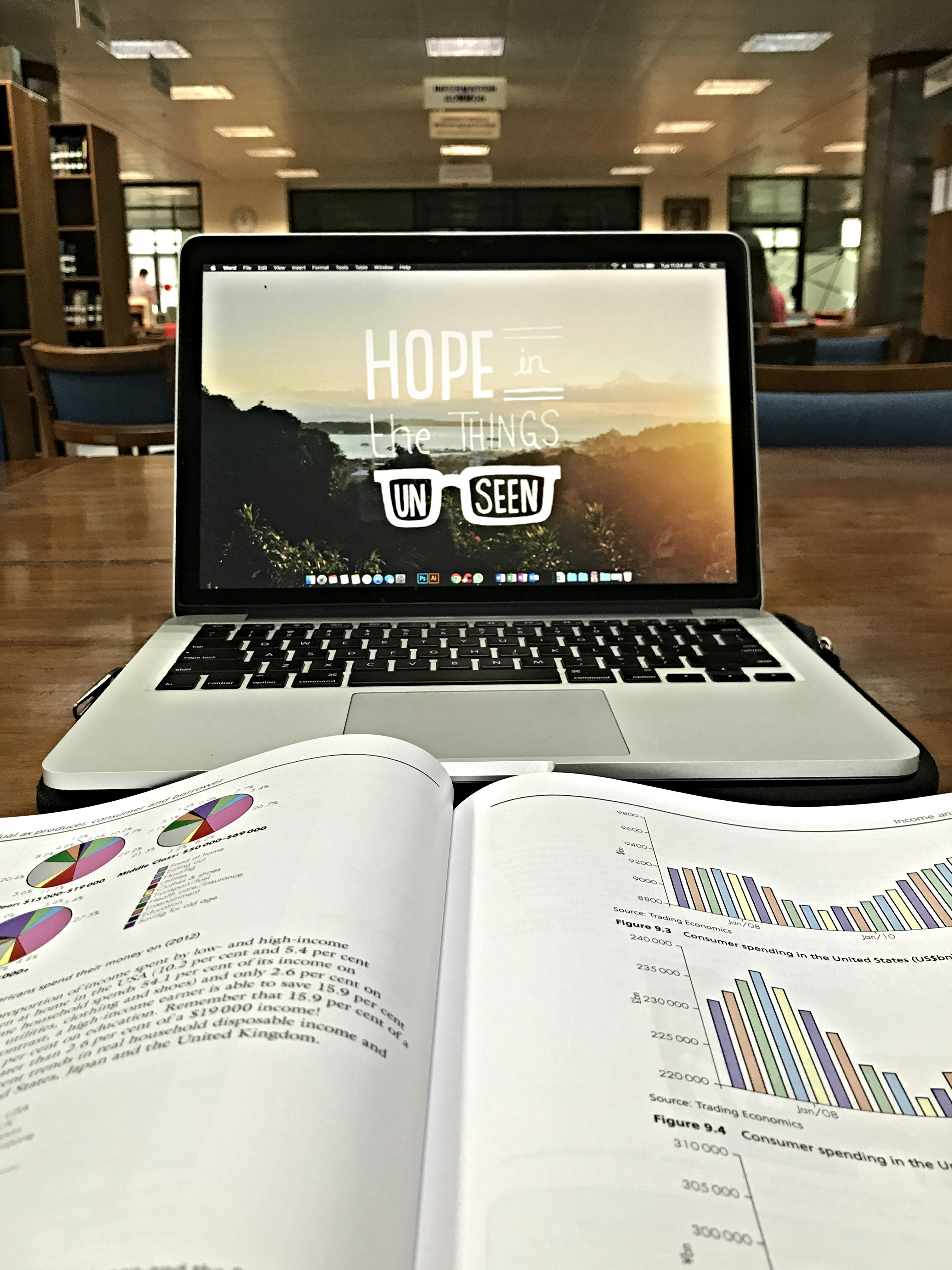 Digital product ideas: laptop displaying an open book