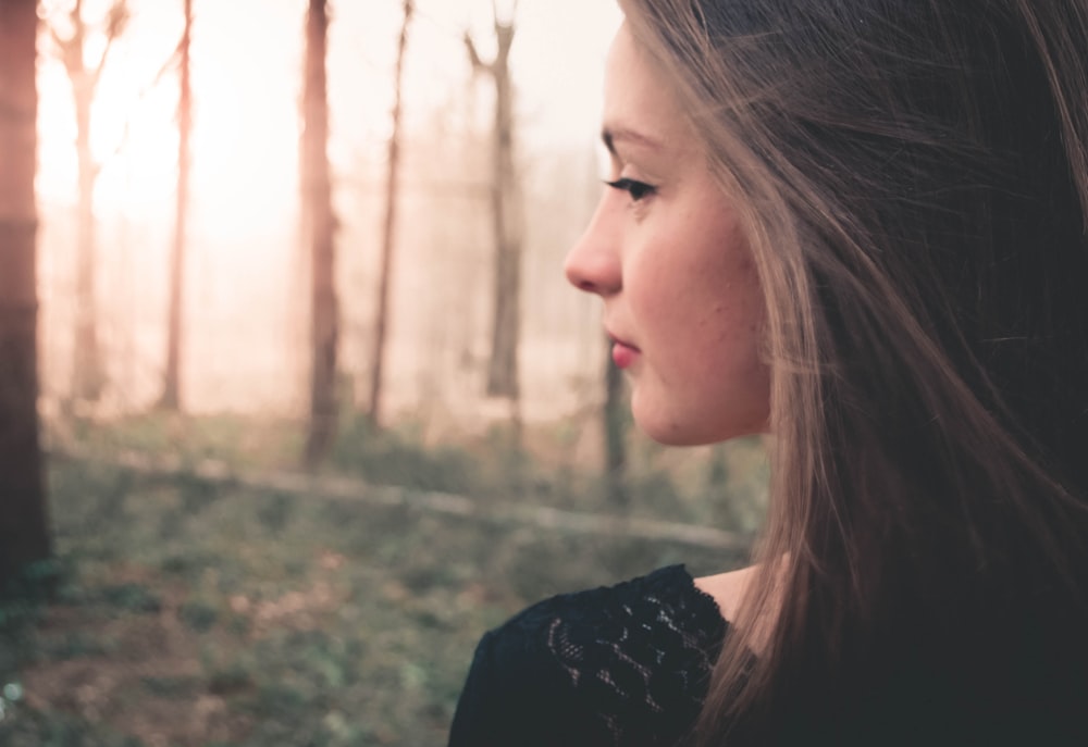 selective focus photography of woman's side view face