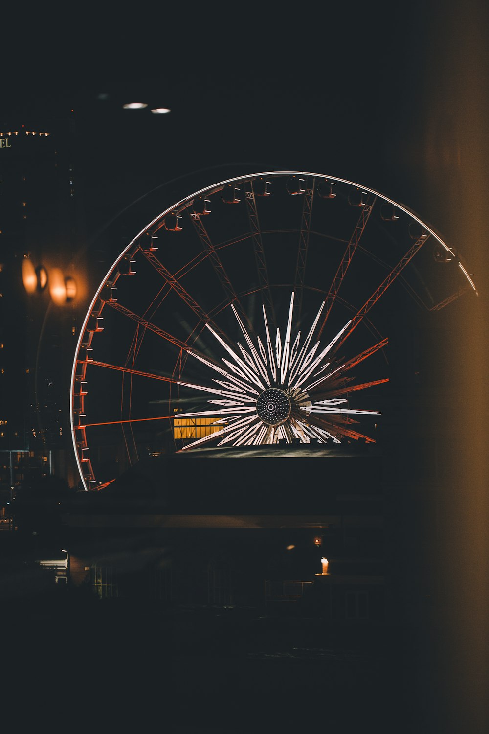 gray and black lighted Ferris wheel during nighttime
