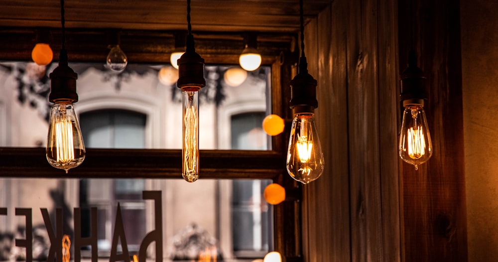 a group of light bulbs hanging from a ceiling