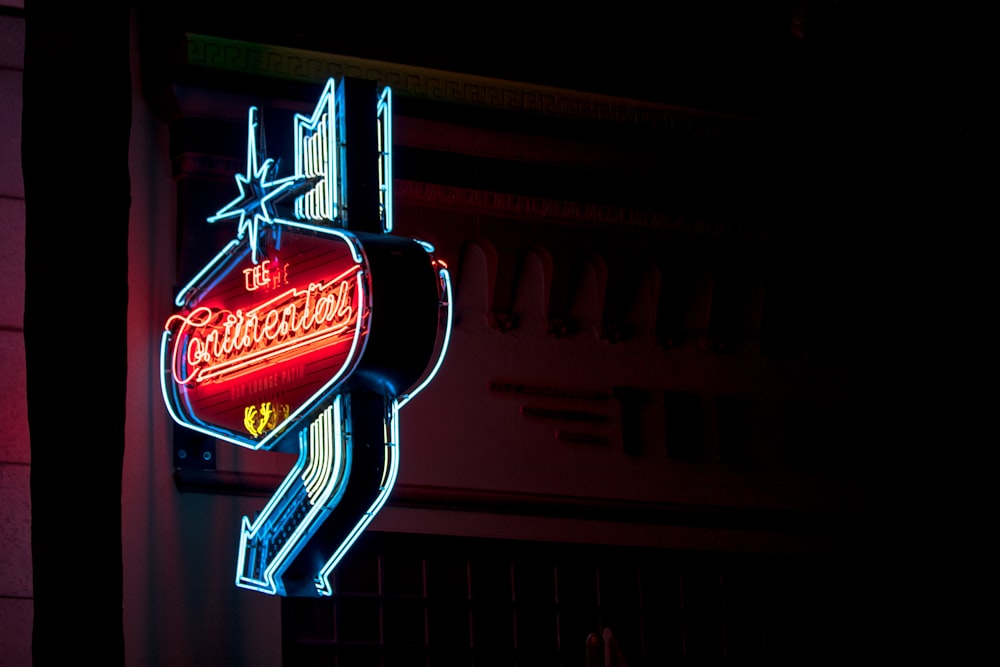 turned-on red and white neon signage