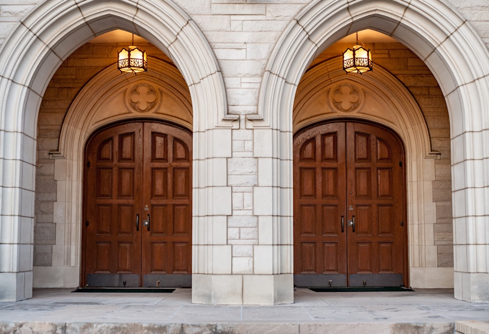 two white and brown wooden doors