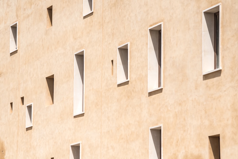 brown concrete building at daytime