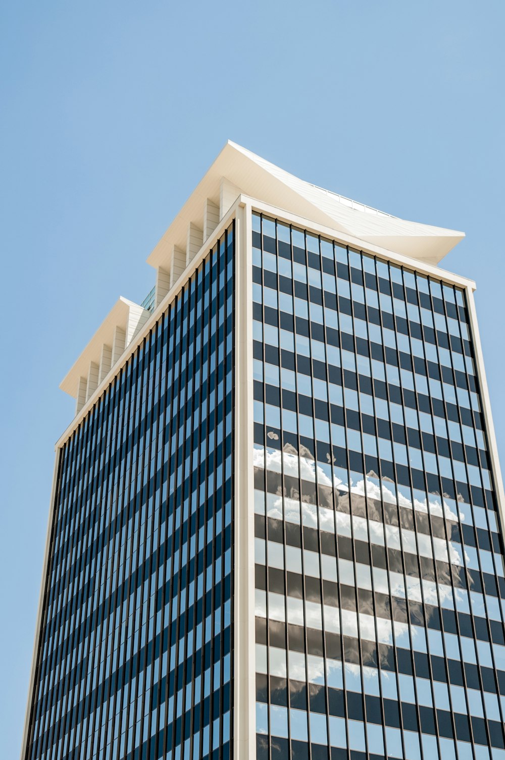 low angle photography of curtain wall building