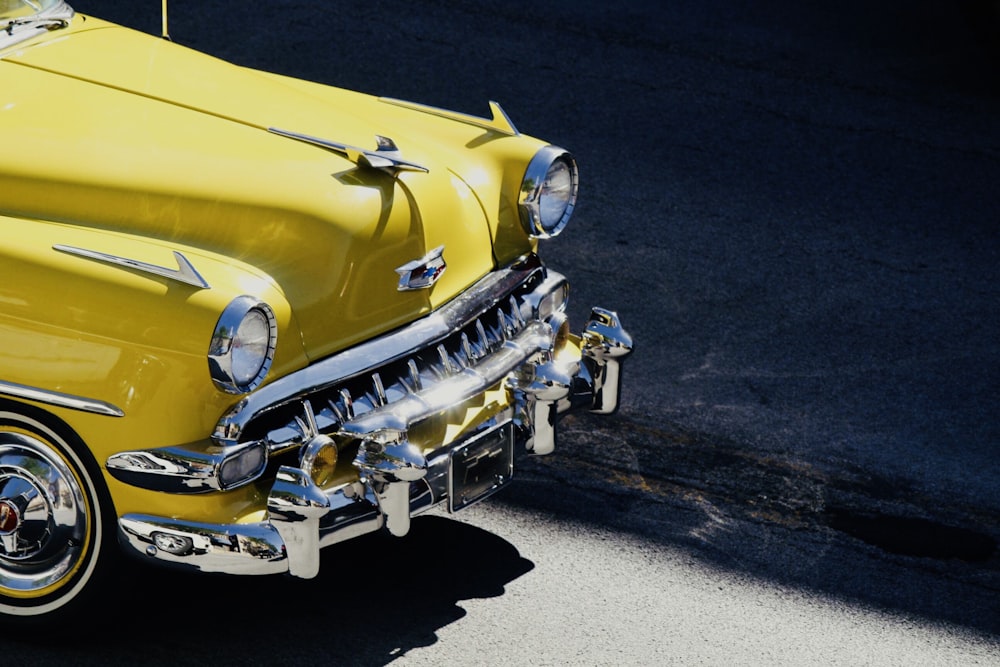 photo of yellow Cadillac car
