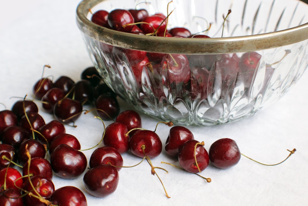 bunch of red cherry fruits