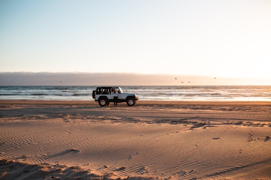 white wrangler beside the beach in Pismo State Beach United States