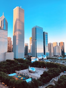 people gathering on Cloud Gate, Chicago, Illinois near buildings