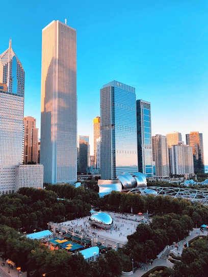 people gathering on Cloud Gate, Chicago, Illinois near buildings