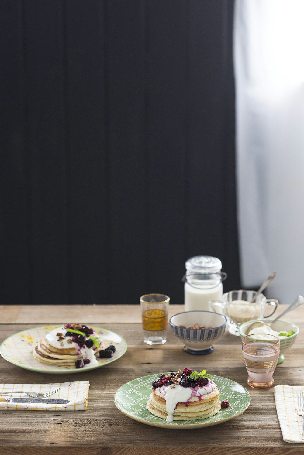 pancake with cream toppings on plate