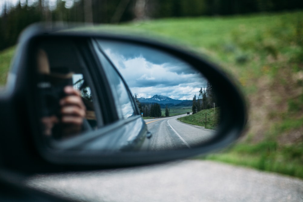 black framed wing mirror