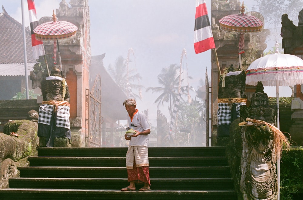 man standing on staircase