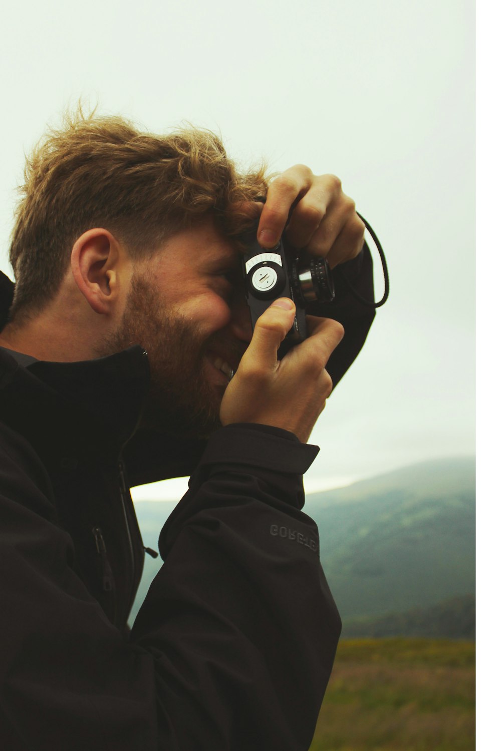 person using black camera