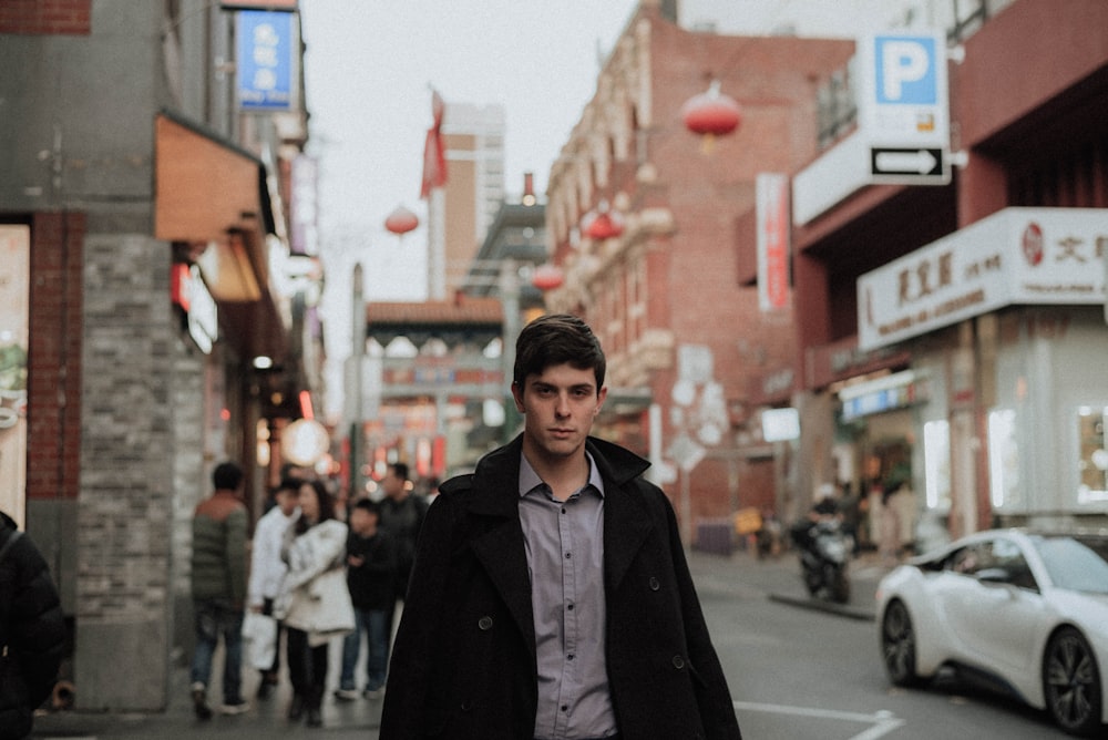 man crossing on road