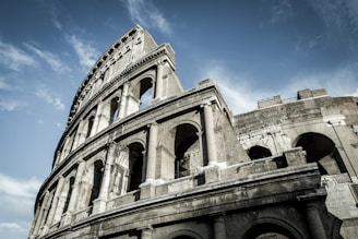 low-angle photo of The Colosseum in Ancient Rome