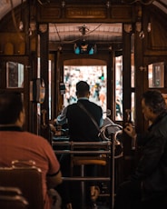 people sitting in tram