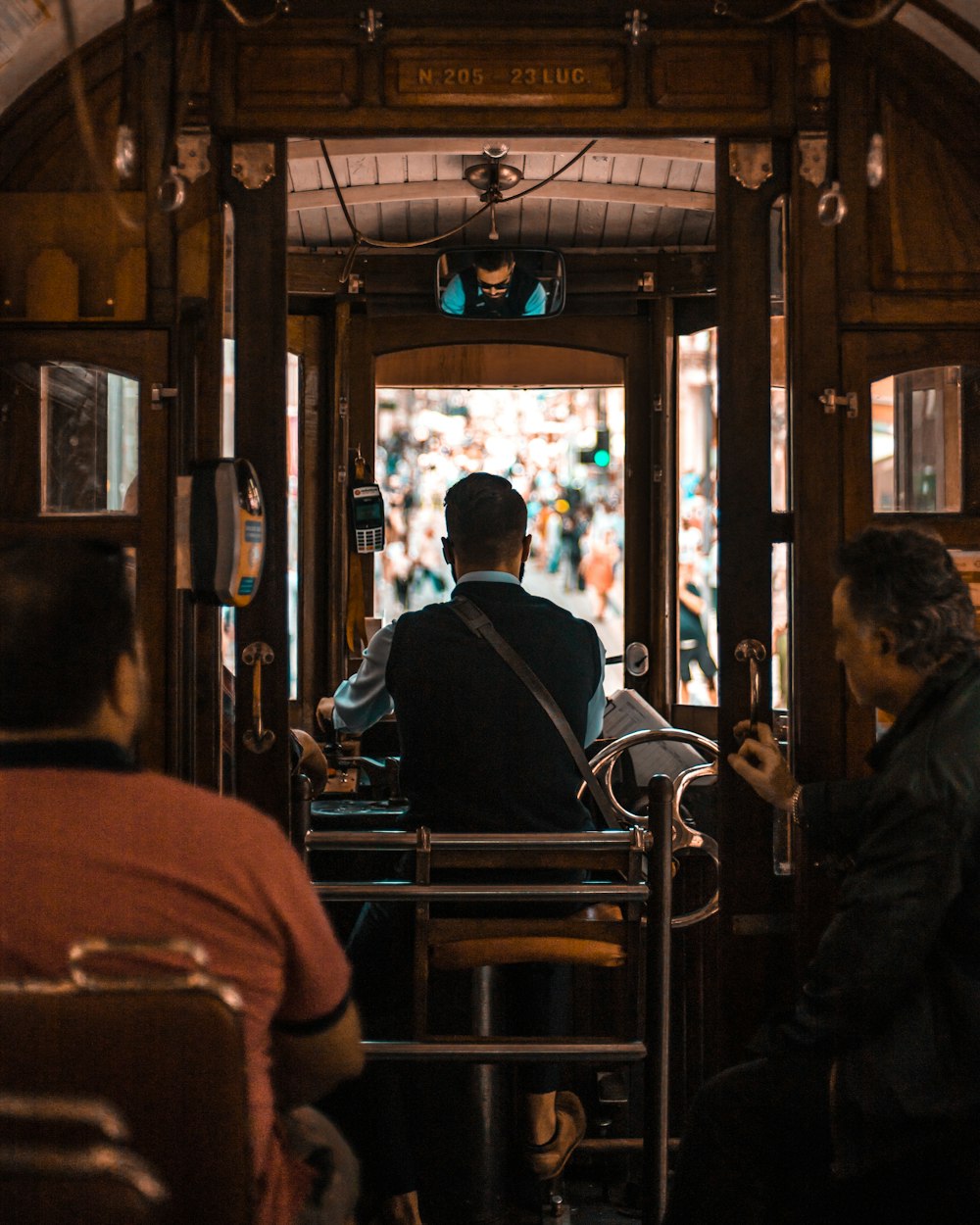 people sitting in vehicle