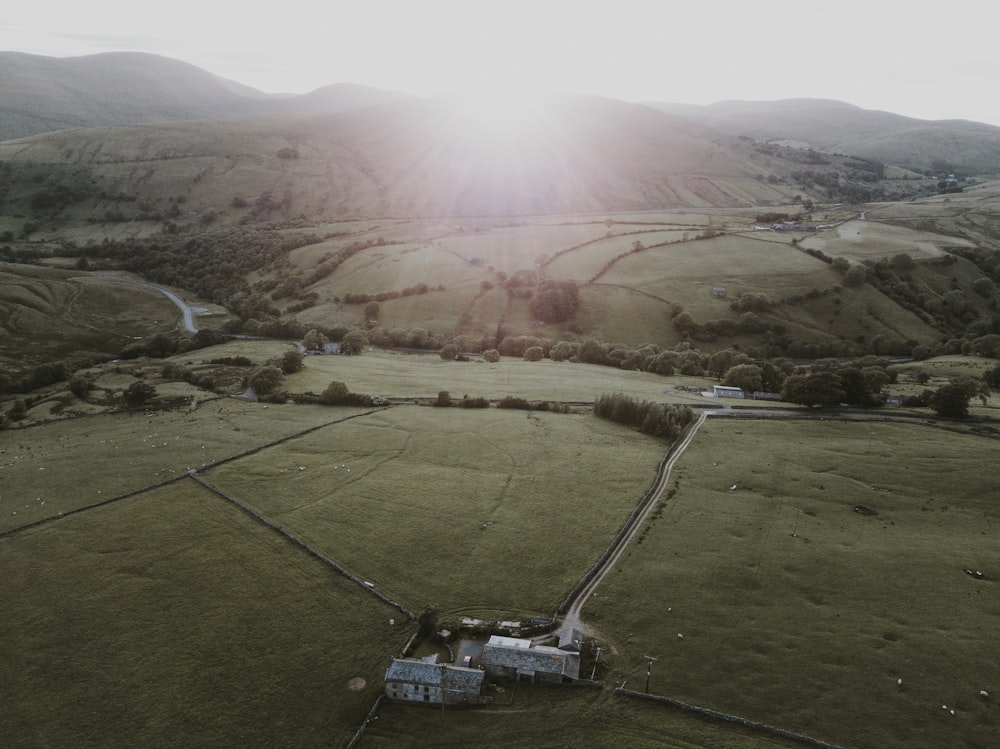 house in the middle of field