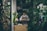 woman standing beside the table