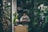 woman standing beside the table