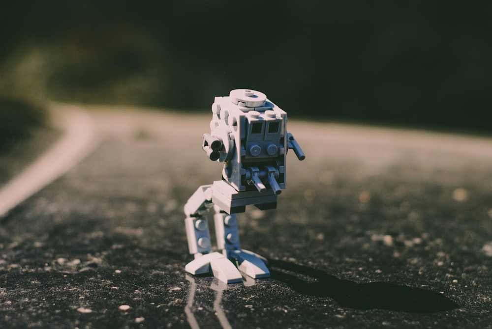 Lego toy on asphalt road