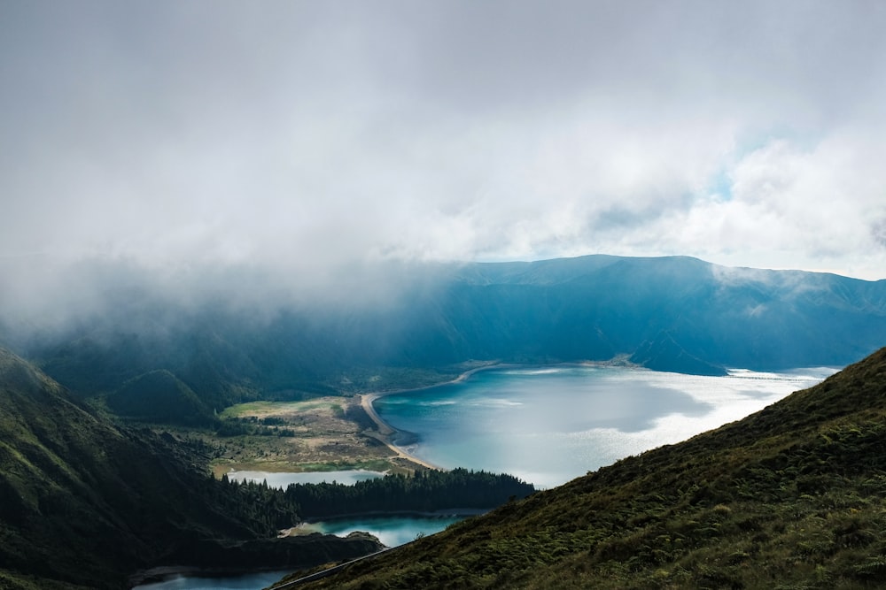 lake near forest during daytime