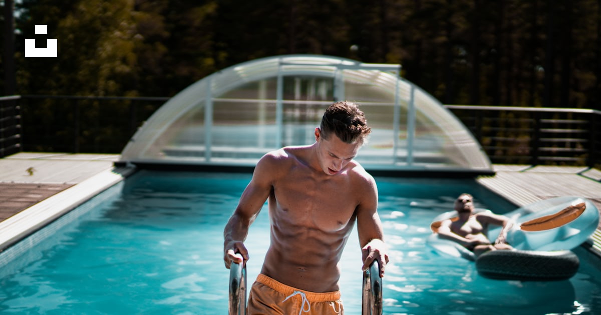Man holding grey steel swimming pool ladder photo – Free Sweden Image ...