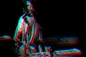 man standing in front DJ controller with photo effect