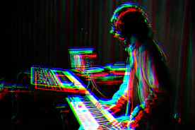 man playing electronic keyboard