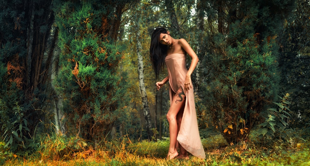 woman wearing pink strapless dress